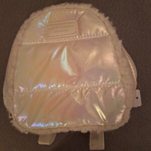 Gorgeous Bath And body works mini knapsack in shiny white